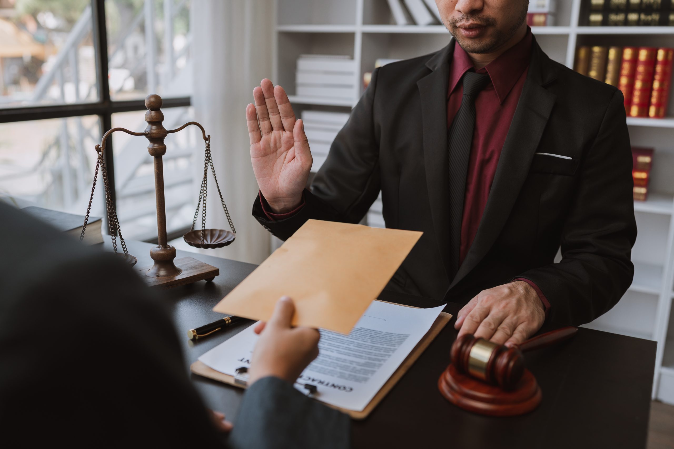 Lawyer or legal adviser, businessman refusing money coming with paper envelope Anti-bribery agreement and anti-corruption concept.